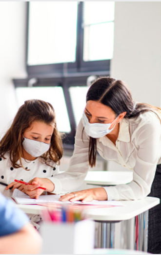 tutor with face mask and student